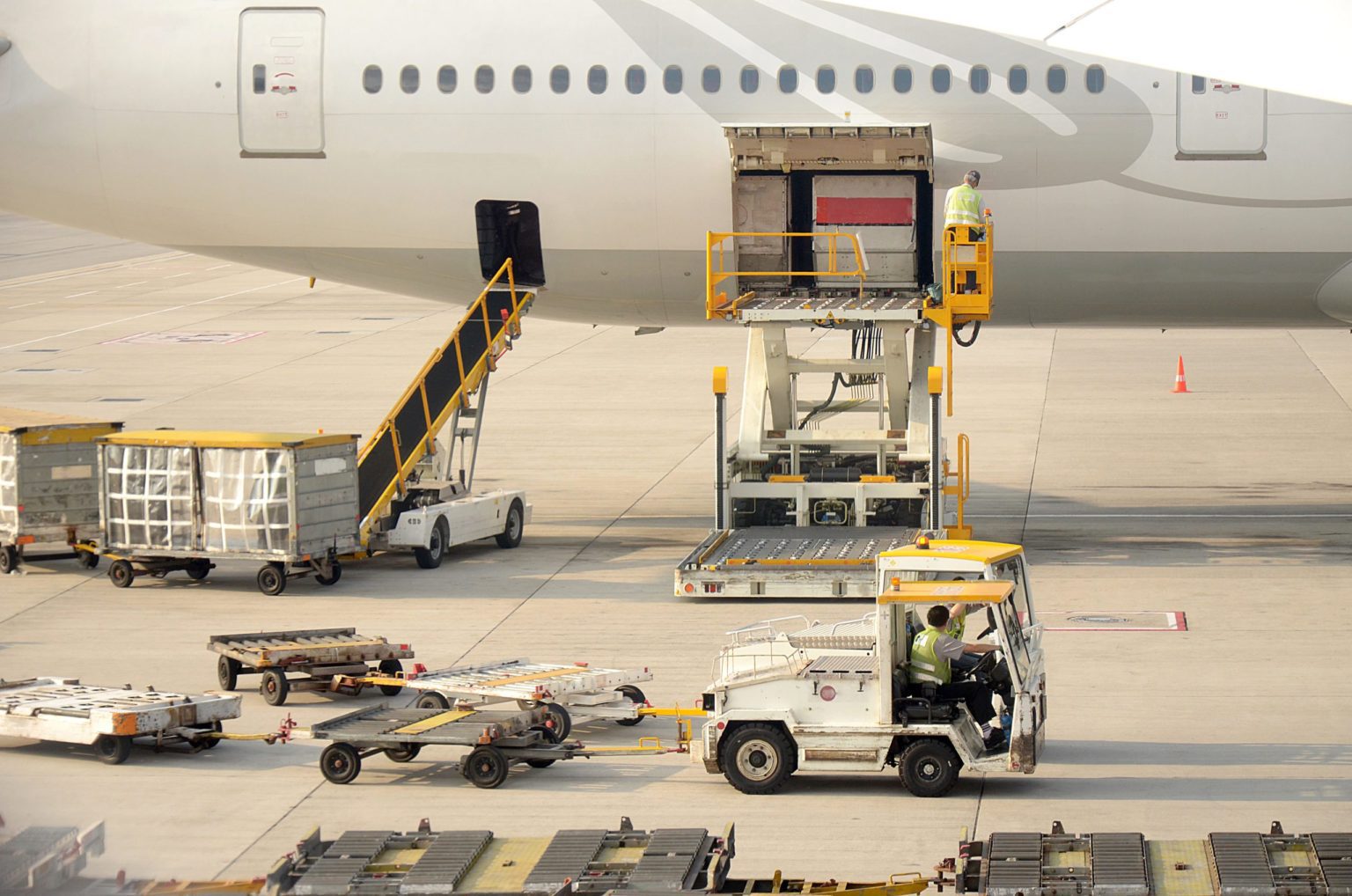 7.4 - Personnel Responsible for Handling Cargo in a Warehouse, Loading ...